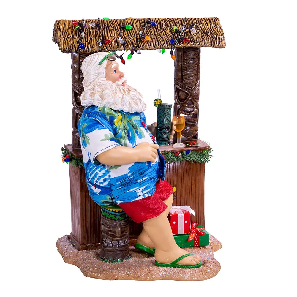 Kurt Adler 11-Inch Fabriché™ Beach Santa Sitting At Tiki Bar
