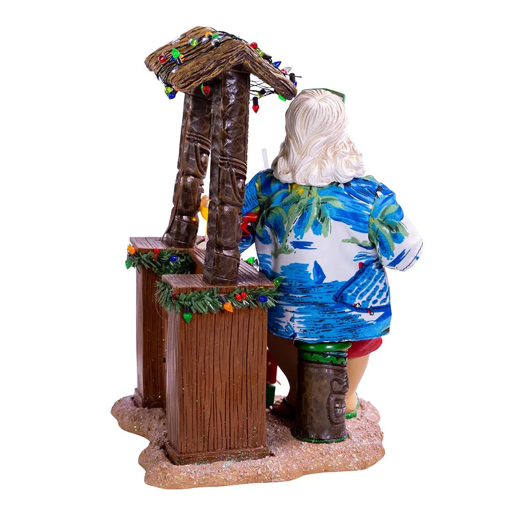 Kurt Adler 11-Inch Fabriché™ Beach Santa Sitting At Tiki Bar